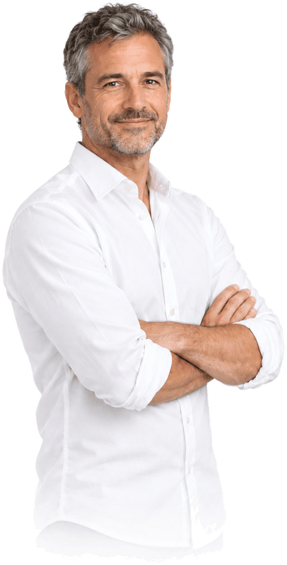 A physician, arms crossed, smiling